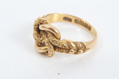 Lot 212 - 18ct gold double knot ring