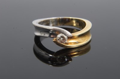 Lot 225 - 14ct gold diamond single stone crossover ring