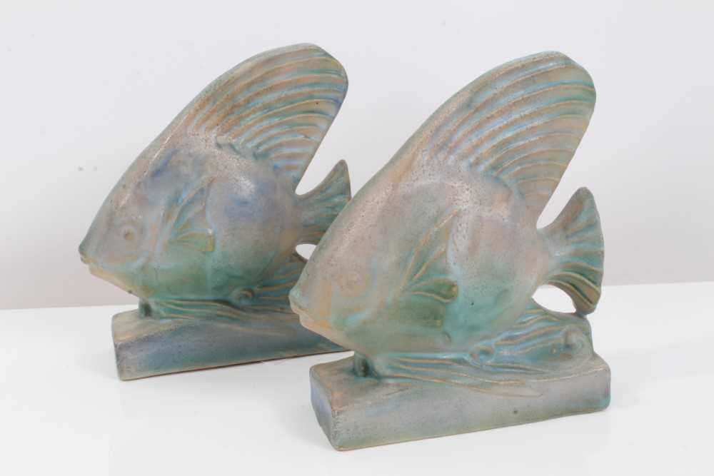 Lot 1053 - Two pairs of Bourne Denby Danesby bookends - fish and dogs