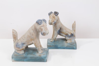 Lot 1053 - Two pairs of Bourne Denby Danesby bookends - fish and dogs