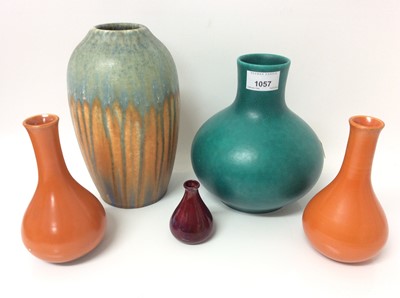 Lot 1057 - Royal Lancastrian Green glazed pottery vase, pair Lancastrian bottle vases, miniature flambé vase and Ruskin pottery vase (5)