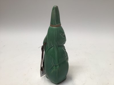 Lot 1059 - Rare 1930s Denby green glazed rabbit decanter and stopper by Donald Gilbert, 27.5cm high