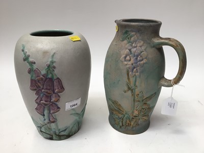 Lot 1064 - 1930s Denby Danesby Ware vase with floral decoration, 25cm high and a Danesby Ware jug, 27.5cm high (2)