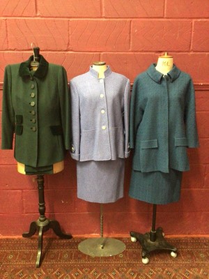 Lot 1977 - Laura B Couture clothing including two boucle wool skirt suits, green wool crepe 3/4 coat with velvet trim and yellow metal chain inside hem, a soft boucle knit jacket, navy jacket and a 3/4 length...