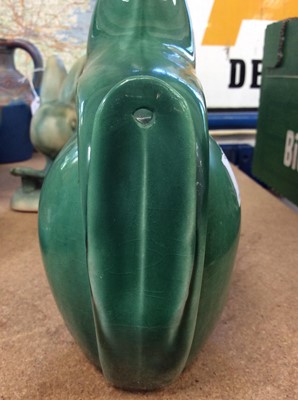 Lot 1069 - Rare 1930s Denby Velray green glazed squirrel with stopper