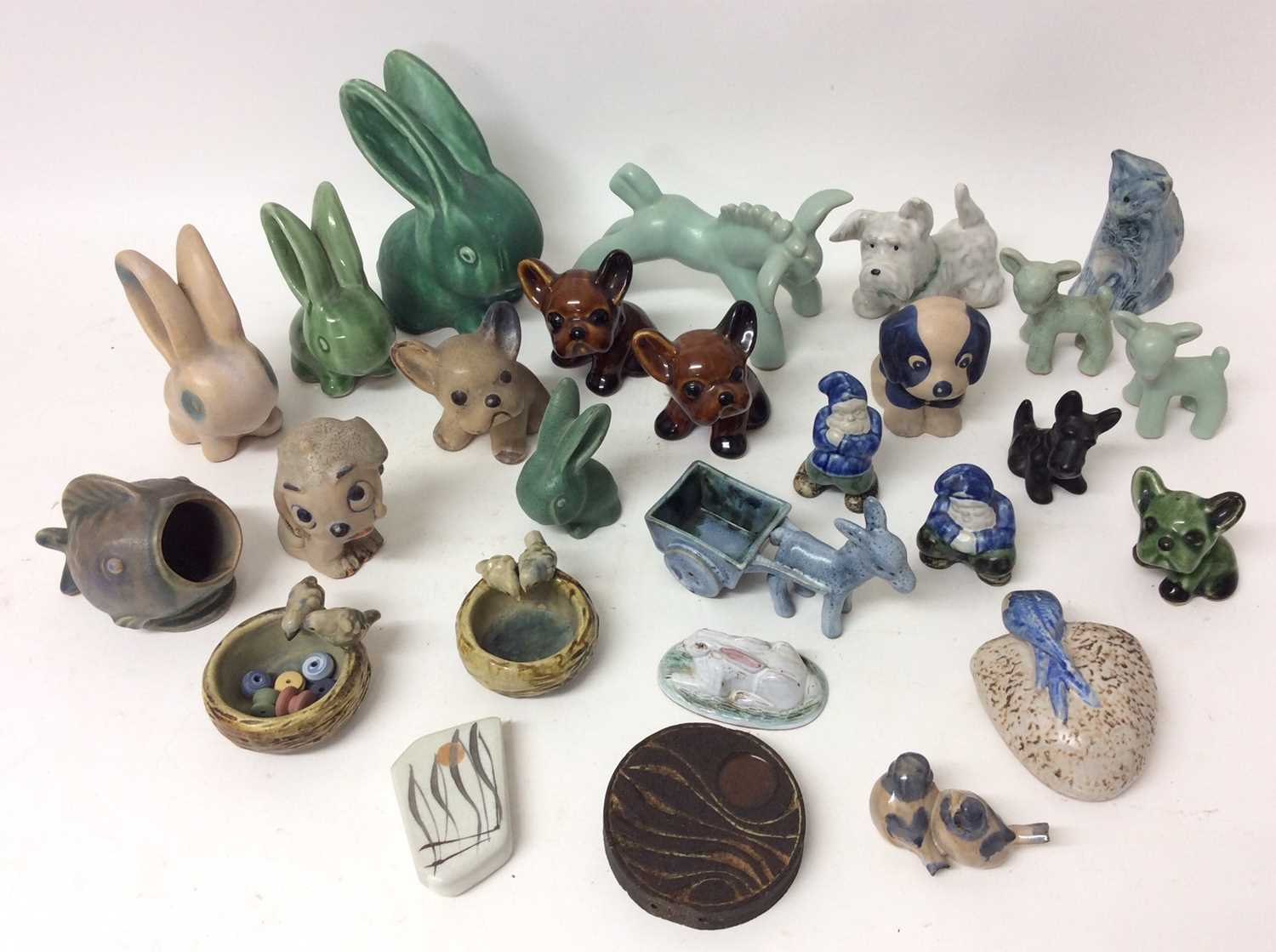 Lot 1070 - Collection of pottery animal ornaments comprising rabbits, dogs, birds and figures, makers to include Denby (qty)