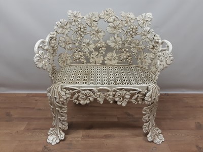 Lot 1543 - Victorian style white painted cast iron garden seat