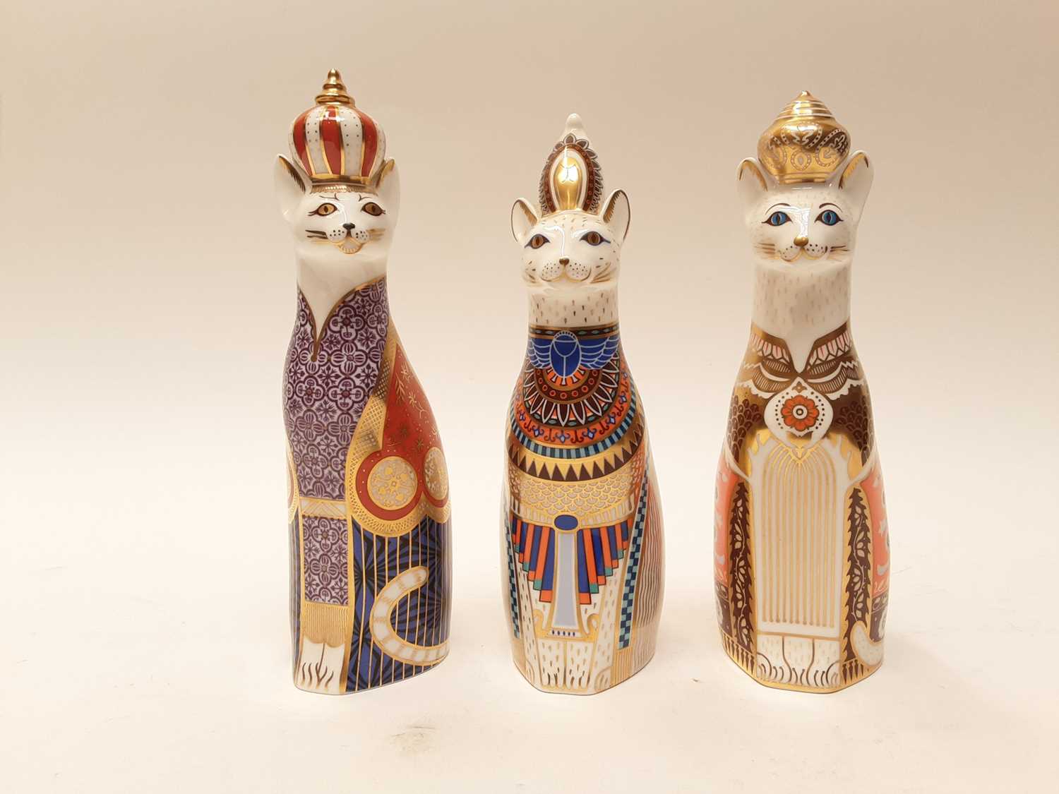 Lot 1085 - Three Royal Crown Derby Royal Cats imari paperweights - Abyssinian, Siamese and Egyptian, tallest is 22.5cm high