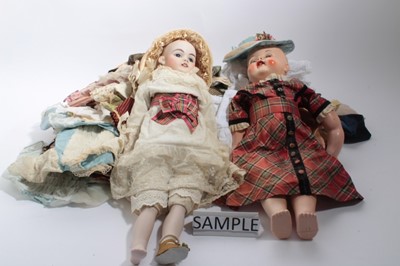 Lot 1660 - A reproduction Simon & Halbig doll plus selection of reproduction twelve dresses, hats and other clothing.