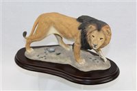 Lot 1143 - Country Artists sculpture of a Lion - Wild...