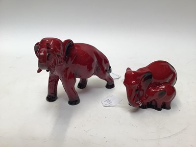 Lot 1106 - Royal Doulton Flambe Elephant and baby Elephant