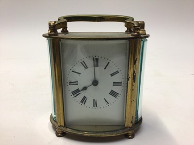 Lot 2244 - Three French brass carriage clocks with enamel dials, together with a carriage clock case and a small quantity of Masonic jewels