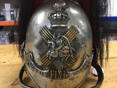 Lot 735 - Scarce Victorian Forfarshire Light Horse troopers 1871 Pattern helmet with white metal and brass helmet plate , white metal skull with associated horse hair plume , original chin chains and leather...