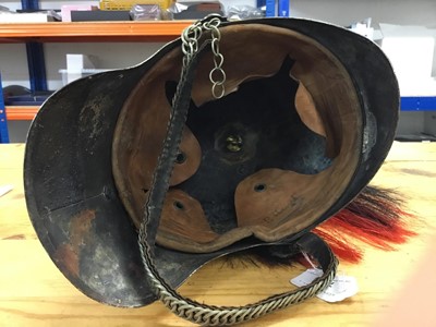 Lot 735 - Scarce Victorian Forfarshire Light Horse troopers 1871 Pattern helmet with white metal and brass helmet plate , white metal skull with associated horse hair plume , original chin chains and leather...