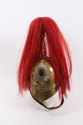 Lot 736 - Victorian Dragoon Guards 1871 Pattern helmet with later alterations, red plume, brass chin chain - lining missing