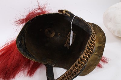 Lot 736 - Victorian Dragoon Guards 1871 Pattern helmet with later alterations, red plume, brass chin chain - lining missing