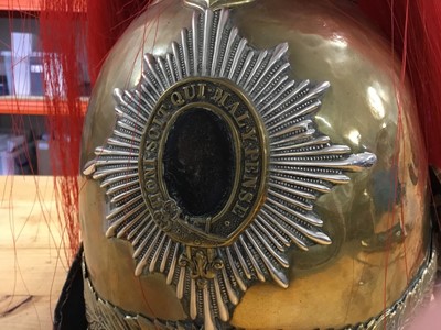 Lot 736 - Victorian Dragoon Guards 1871 Pattern helmet with later alterations, red plume, brass chin chain - lining missing