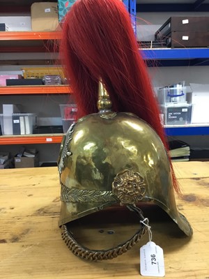 Lot 736 - Victorian Dragoon Guards 1871 Pattern helmet with later alterations, red plume, brass chin chain - lining missing