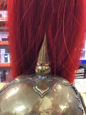Lot 736 - Victorian Dragoon Guards 1871 Pattern helmet with later alterations, red plume, brass chin chain - lining missing