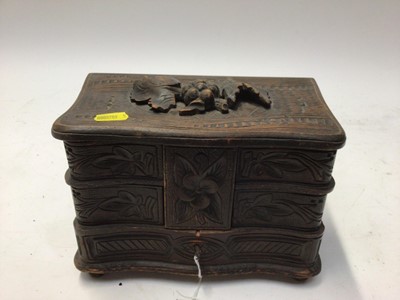 Lot 2263 - Black Forest carved wood jewellery box and two crests