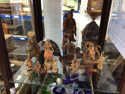 Lot 2262 - Collection of wooden carvings, including a Chinese figure, a further Chinese root carving, a Black Forest bear, Anri figures, etc (qty)