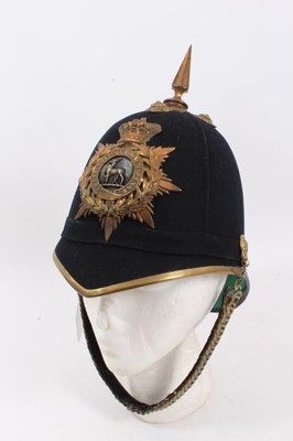 Lot 742 - Victorian Officers blue cloth helmet of the Royal Warwickshire Regiment with silvered and gilt helmet plate, original silk and leather lining .