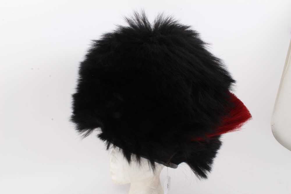 Lot 751 - Elizabeth II Guardsmen's bearskin with red