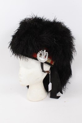 Lot 752 - 1950s Scottish Regimental Ostrich feather bonnet with modern Cameron Highlanders badge