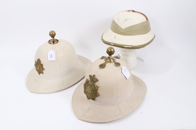 Lot 753 - Two Royal Marines dress helmets with ball mounts