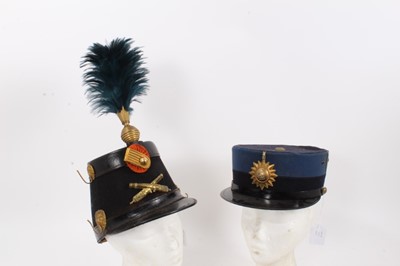 Lot 755 - Two First World War Belgian Artillery Officers Kepis, another Infantry Officers kepi with feather plume and Portuguese cap (4)