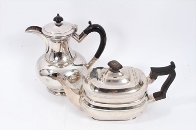 Lot 237 - Edwardian silver teapot, together with a silver plated hot water pot (2)