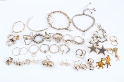 Lot 236 - Group of contemporary silver jewellery to include rings, earrings, charms and other similar pieces