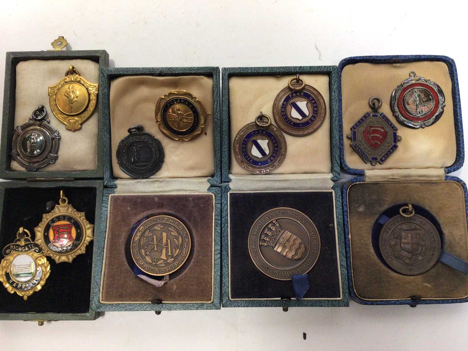 Lot 2299 - Box of 1960s athletics medals, mostly in cases