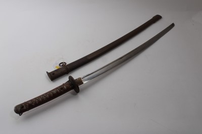 Lot 957 - Second World War Japanese N.C.O's Katana with cast alloy hilt, curved fullered blade, sharpened for active service, numbered 101753 in steel scabbard, numbered 105486, blade 67cm in length