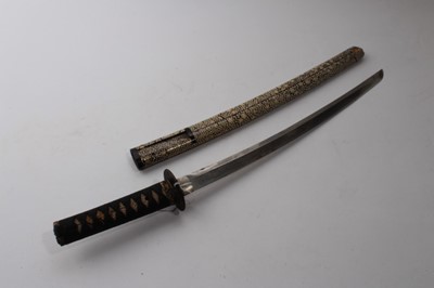 Lot 960 - 19th century Japanese Wakizashi, with unsigned curved steel blade, in shagreen covered scabbard, blade 45.5cm, 66.5cm overall