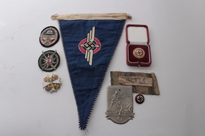 Lot 762 - Collection of replica Nazi German badges to include an N.S.D.A.P. Party members badge, Hitler Youth badge, N.S.K.K. shield badge and D.L.V. pennant