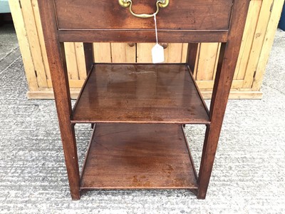 Lot 915 - Georgian mahogany three tier side table, the single drawer flanked by twin drop flaps and two plain tiers below, alterations