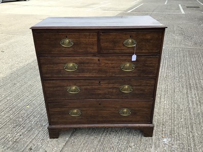 Lot 911 - George III oak chest of two short and three long drawers with oval brass handles, on bracket feet