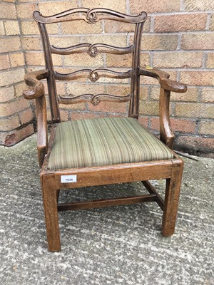 Lot 1036 - Edwardian child's chair in the Georgian style, with pierced rail back above scroll arms and drop-in seat, on square legs