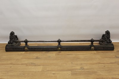 Lot 1451 - An impressive 19th century steel fire curb of classical form