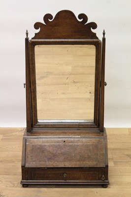 Lot 1453 - 19th century walnut toilet mirror in the 18th century style, the rectangular mirrored plate above a miniature fitted bureau and single drawer, on bun feet