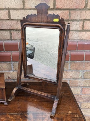 Lot 912 - George III mahogany toilet mirror, the plateau base with three drawers, together with another mirror