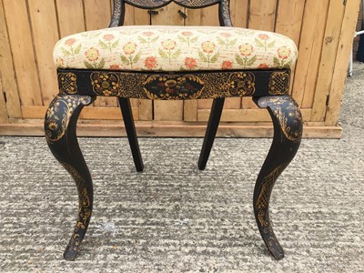 Lot 927 - 19th century lacquered side chair, the shaped back painted with waterfall and coastal scene within gilt scroll borders, drop-in seat, one scroll legs