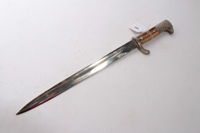 Lot 966 - Nazi Police Bayonet, with polished steel blade by Weyersberg, Kirschbaum & Co, Solingen, two piece horn grip with replacment badge and eagles head pommel, in leather scabbard with nickel plated mou...