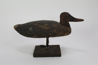Lot 172 - Wooden decoy duck raised on stand
