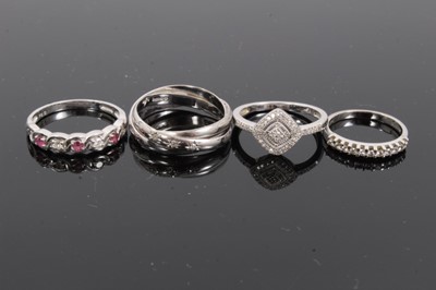 Lot 235 - Four 9ct white gold diamond set rings