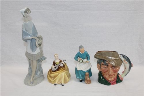 Lot 1173 - Two Royal Doulton figures - The Favourite...
