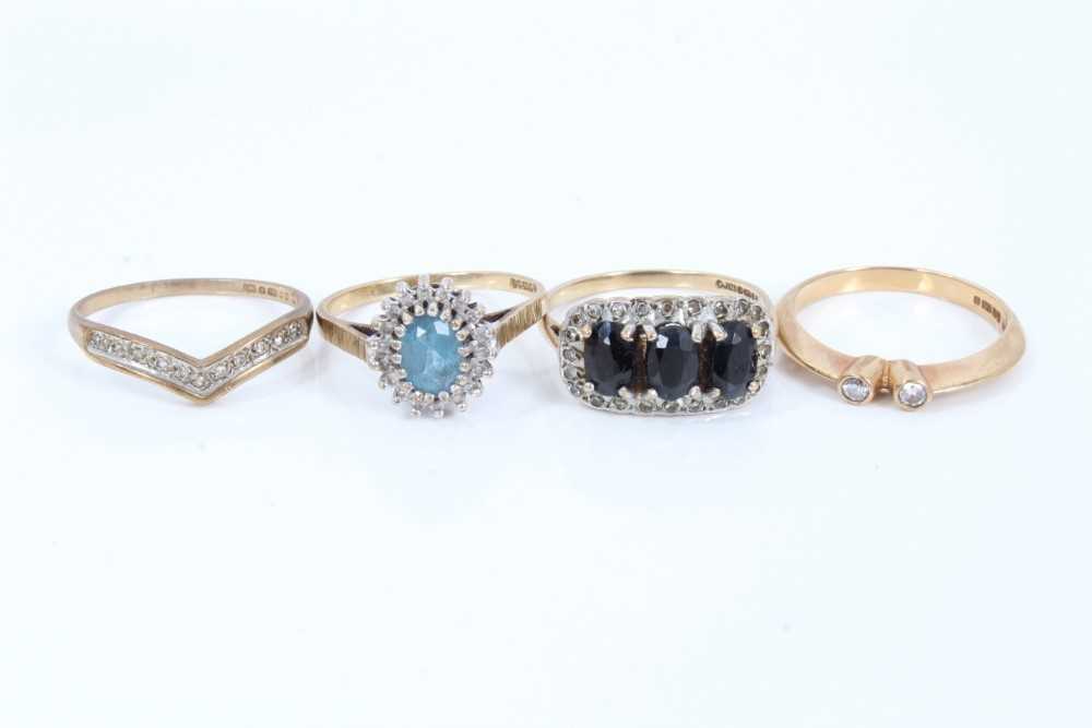 Lot 254 - Four 9ct gold diamond and gem set rings