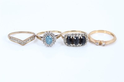 Lot 254 - Four 9ct gold diamond and gem set rings