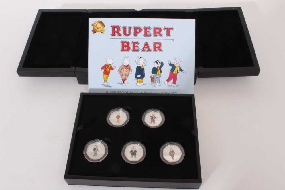 Lot 489 - G.B.- London Mint Office issued Rupert Bear, silver proof fifty pence with colour five coin set (cased with certificate of authenticity), (1 coin set)